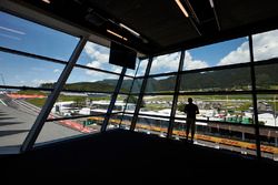 A spectator views the circuit from the media centre