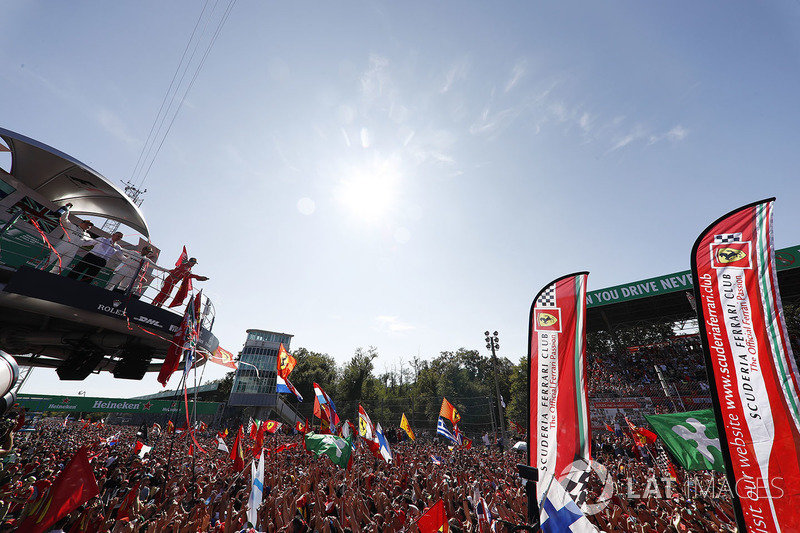 Third place Sebastian Vettel, Ferrari, celebrates, a partisan crowd