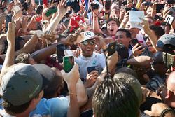 Lewis Hamilton, Mercedes AMG F1, gets mobbed by fans