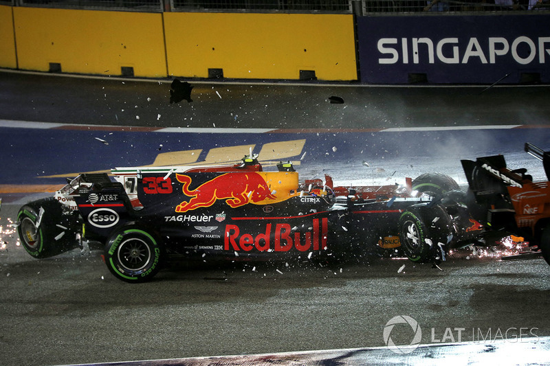 The cars of Kimi Raikkonen, Ferrari SF70H and Max Verstappen, Red Bull Racing RB13 crash and collide