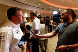 Zak Brown, Executive Director, McLaren Technology Group talks to the media after announcing Fernando