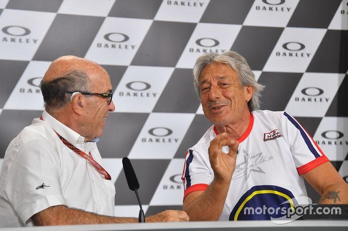 Marco Lucchinelli y Carmelo Ezpeleta, CEO de Dorna Sports