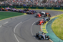 Lewis Hamilton, Mercedes AMG F1 W08, leads the field through the first corner