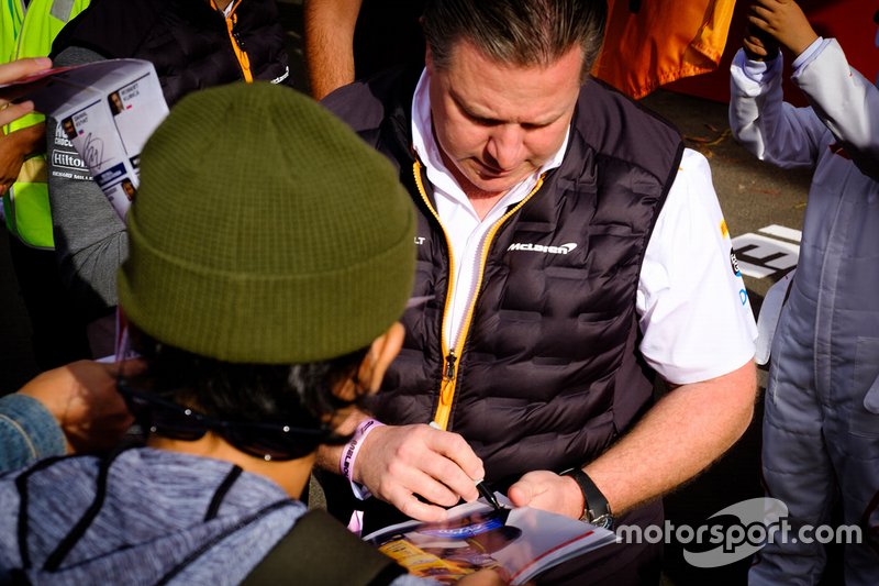Zak Brown, McLaren Executive Director signs autographs for the fans