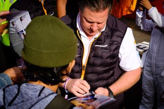 Zak Brown, McLaren Executive Director signs autographs for the fans