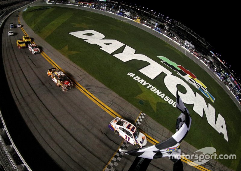 Race winner Denny Hamlin, Joe Gibbs Racing Toyota take the checkered flag