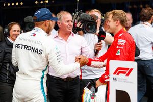 Lewis Hamilton, Mercedes AMG F1 and Sebastian Vettel, Ferrari in parc ferme with Martin Brundle, Sky TV