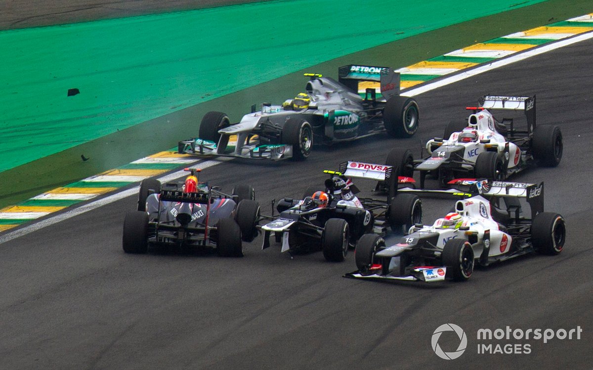 Bruno Senna, Williams FW34 Renault colides with Sebastian Vettel, Red Bull RB8 Renault