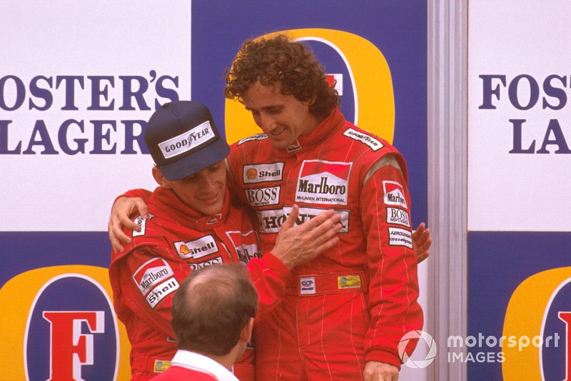 Podium: race winner Ayrton Senna, McLaren congratulates second place Alain Prost, McLaren with Ron Dennis looking on