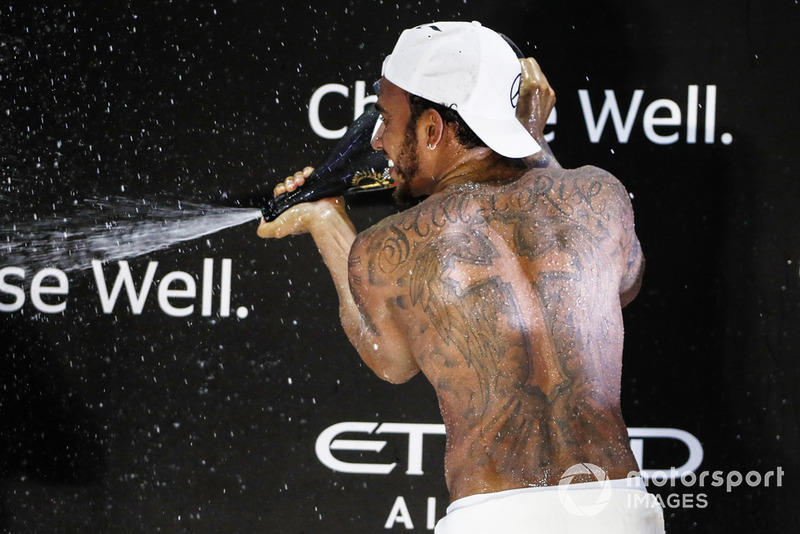 Lewis Hamilton, Mercedes AMG F1 W09 EQ Power+, sprays the champagne on the podium