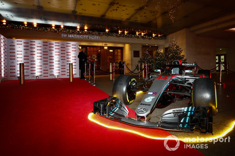 A Mercedes F1 car on the red carpet