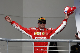 Kimi Raikkonen, Ferrari, 1st position, arrives on the podium