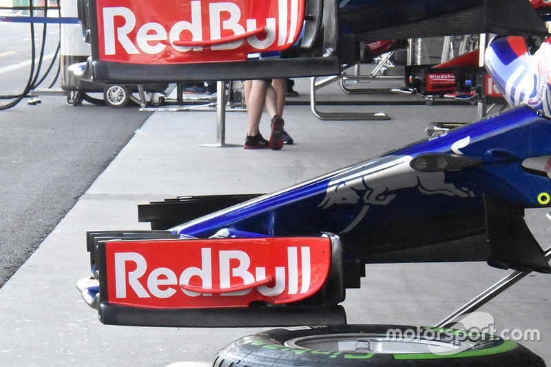 For comparison, the older specification front wing endplate on the STR13 that extends further back.