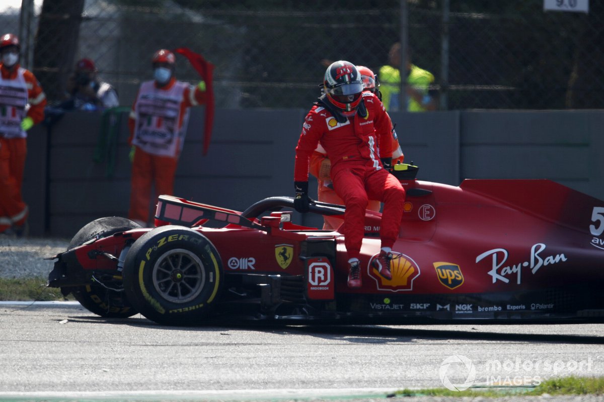 Carlos Sainz Jr., Ferrari SF21, gets out of his car after crashing