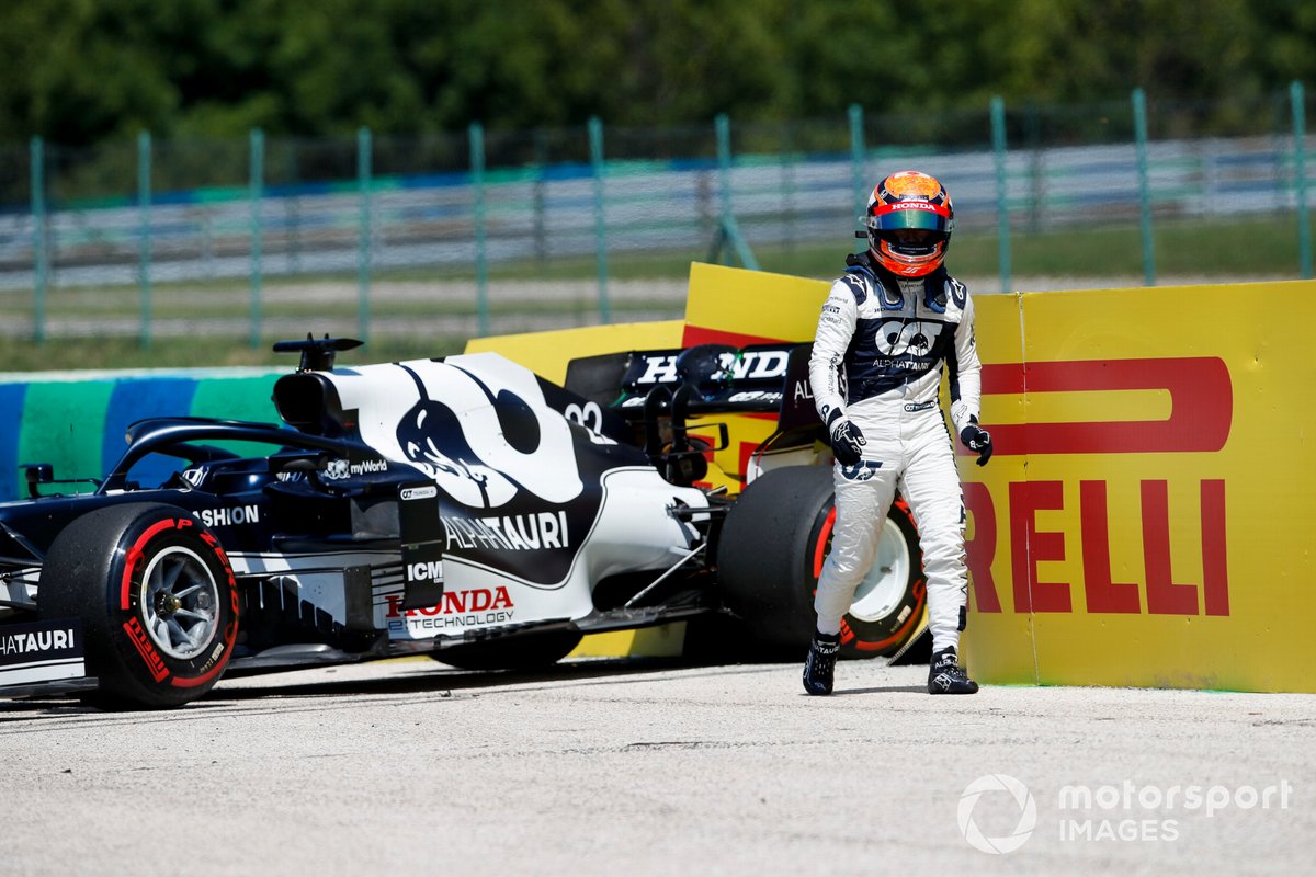 Yuki Tsunoda, AlphaTauri, walks away from his car after spinning out in practice