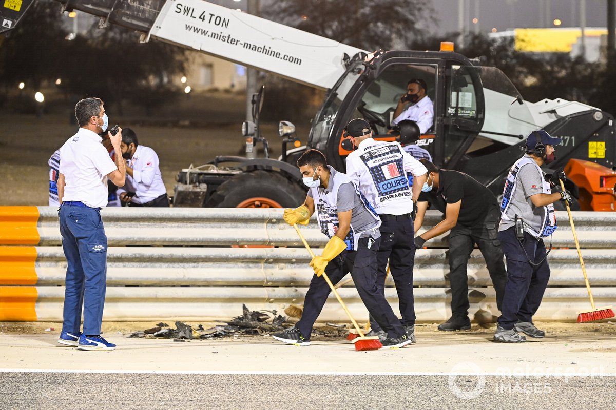Michael Masi, Race Director, FIA, attends the scene of the huge crash for Romain Grosjean, Haas VF-20, on the opening lap