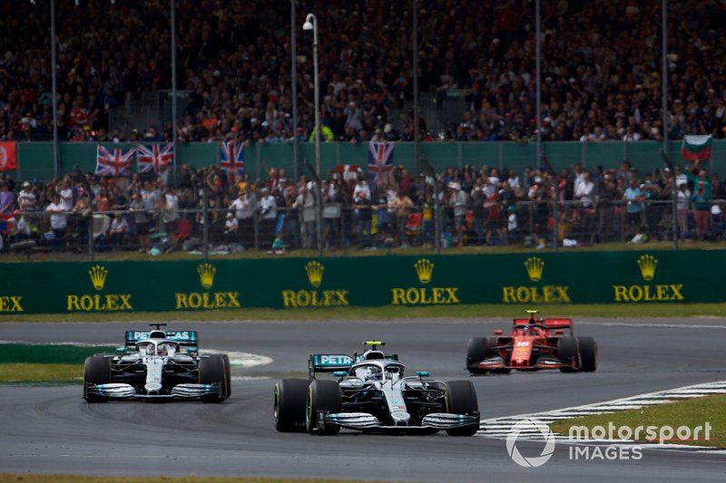 Valtteri Bottas, Mercedes AMG W10, leads Lewis Hamilton, Mercedes AMG F1 W10, and Charles Leclerc, Ferrari SF90