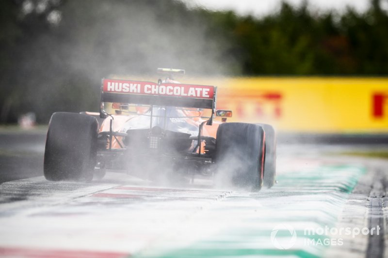 Lando Norris, McLaren MCL34, kicks up cement dust
