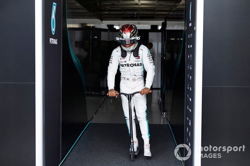 Lewis Hamilton, Mercedes AMG F1, on a scooter
