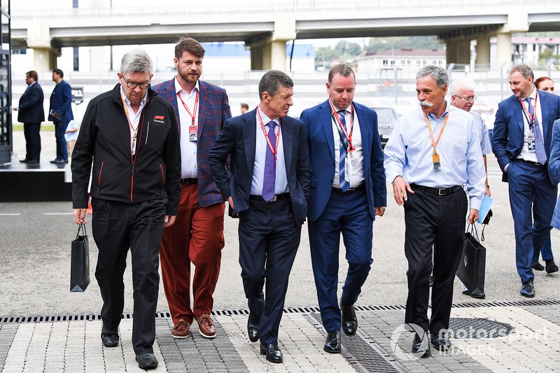 Ross Brawn, Managing Director of Motorsports, FOM, Alexy Titov, Executive Director, Rosgonki, Dmitry Kozak, Deputy Prime Minister of Russian Federation, and Chase Carey, Chairman, Formula 1