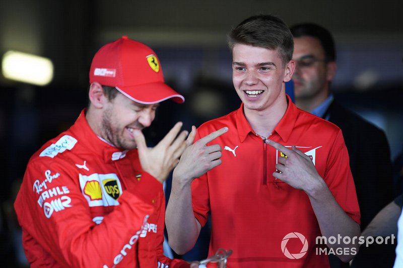 Sebastian Vettel, Ferrari, with Ferrari Driver Academy and F3 racer Marcus Armstrong