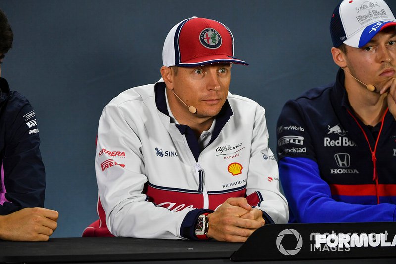 Kimi Raikkonen, Alfa Romeo Racing, and Daniil Kvyat, Toro Rosso