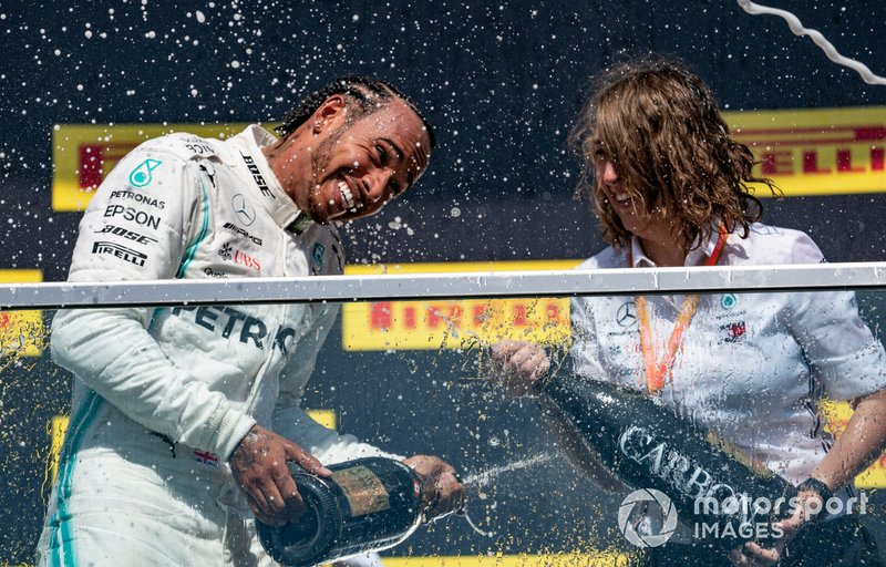 Lewis Hamilton, Mercedes AMG F1, 1st position, sprays Champagne on the podium