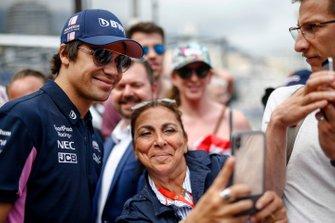 Lance Stroll, Racing Point poses for a selfie with a fan