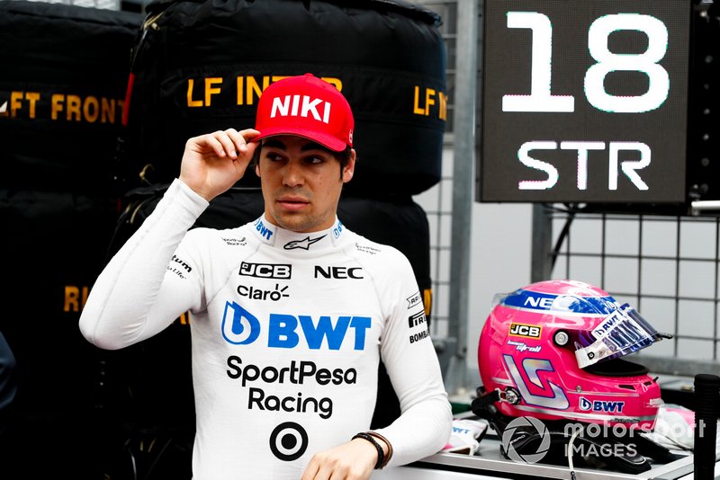 Lance Stroll, Racing Point with a tribute Niki Lauda Red Hat on the grid