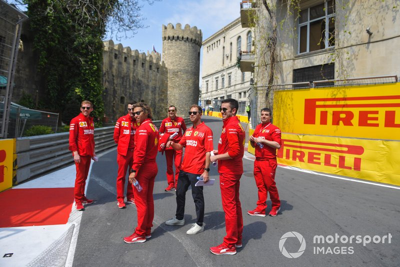Sebastian Vettel, Ferrari walks the track with his engineers