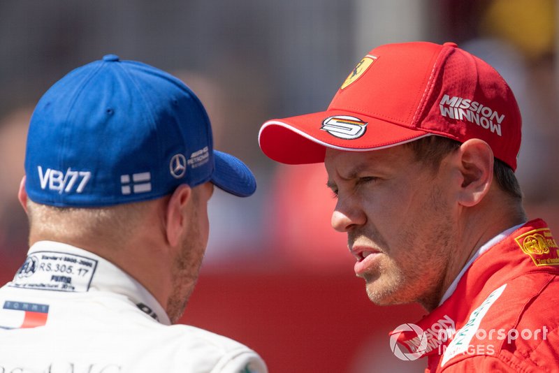 Pole man Valtteri Bottas, Mercedes AMG F1, with Sebastian Vettel, Ferrari, after Qualifying
