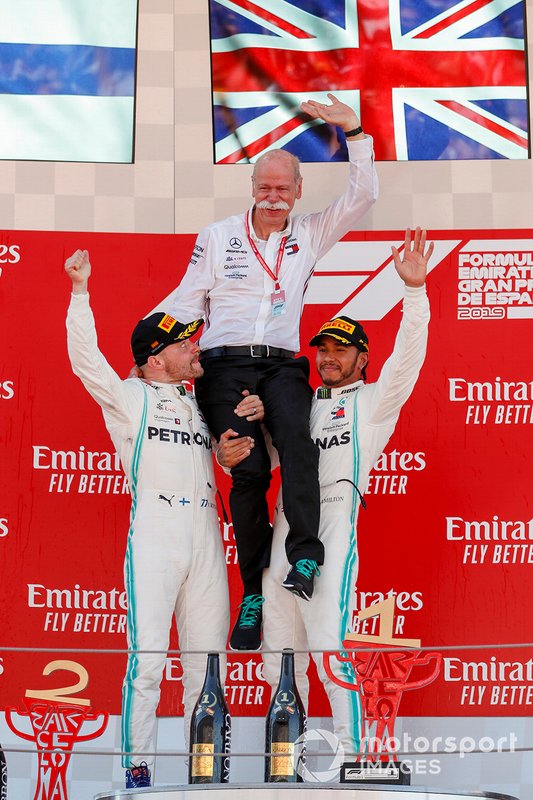 Valtteri Bottas, Mercedes AMG F1, Dr Dieter Zetsche, CEO, Mercedes Benz and Race winner Lewis Hamilton, Mercedes AMG F1 celebrate on the podium