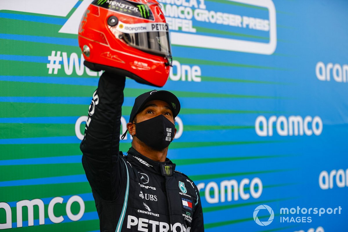 Lewis Hamilton, Mercedes-AMG F1, 1st position, with the helmet of Michael Schumacher gifted to him by Mick Schumacher to commemorate his equal race win record of 91
