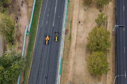 Fernando Alonso, McLaren MCL33 Renault, passes Carlos Sainz Jr., Renault Sport F1 Team R.S. 18