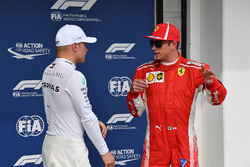 Kimi Raikkonen, Ferrari and Valtteri Bottas, Mercedes-AMG F1 celebrate in parc ferme