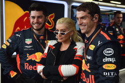 Christina Aguilera, with Red Bull Racing mechanics