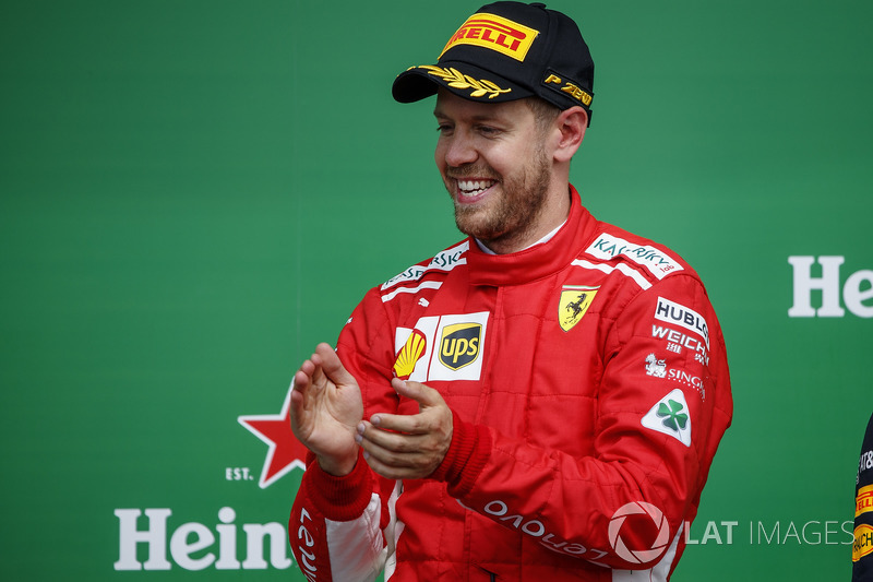Sebastian Vettel, Ferrari, 1st position, celebrates on the podium