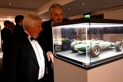 Herbie Blash and Gordon Murray admire a model of a Jim Clark Indianapolis Lotus