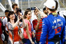 Fans take pictures of Pierre Gasly, Toro Rosso