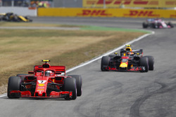 Kimi Raikkonen, Ferrari SF71H, leads Max Verstappen, Red Bull Racing RB14