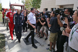 Maurizio Arrivabene, Ferrari Team Principal, Franz Tost, Scuderia Toro Rosso Team Principal and Eric