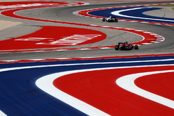 Даниил Квят, Scuderia Toro Rosso STR11, и Валттери Боттас, Williams FW38