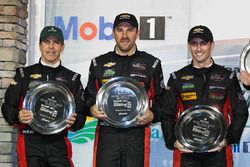 Overall podium: second place Eric Curran, Dane Cameron, Scott Pruett, Action Express Racing