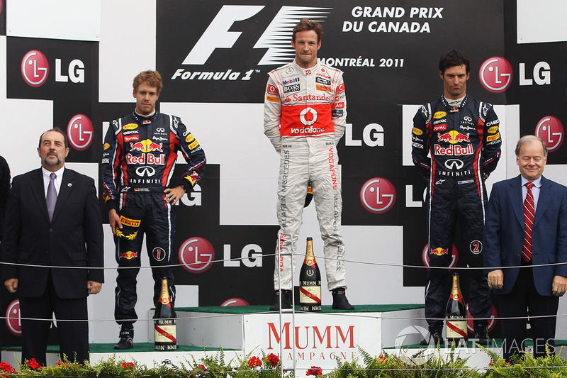 Podium: race winner Jenson Button, McLaren, second place Sebastian Vettel, Red Bull Racing, third place Mark Webber, Red Bull Racing