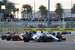 Felipe Massa, Williams FW40 leads Fernando Alonso, McLaren MCL32, Carlos Sainz Jr., Renault Sport F