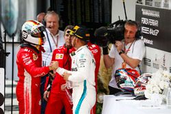 Race winner Sebastian Vettel, Ferrari, Inaki Rueda, Race Strategist, Ferrari, Kimi Raikkonen, Ferrari, 3rd position. and Lewis Hamilton, Mercedes AMG F1, 2nd position