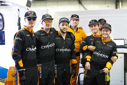 McLaren pit crew with hats celebrating the 300th start for their driver Fernando Alonso, McLaren