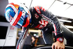 Romain Grosjean, Haas F1 Team, enters his cockpit.