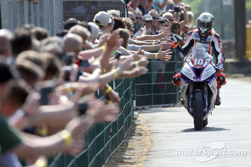 Peter Hickman celebrates winning the RL360º Superstock TT race