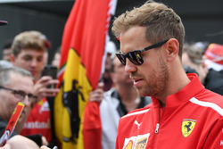 Sebastian Vettel, Ferrari signs autographs for the fans